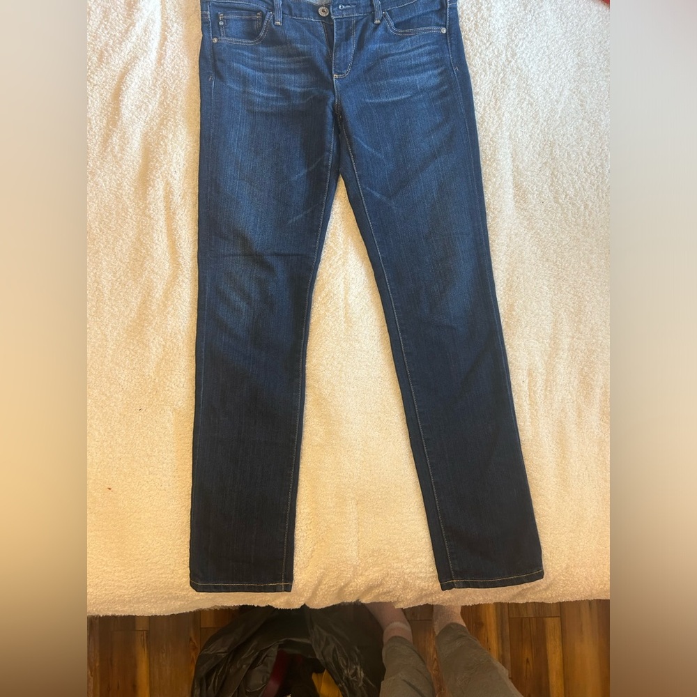 AG Adriano Goldshmied “The Stevie Cuff” jeans.